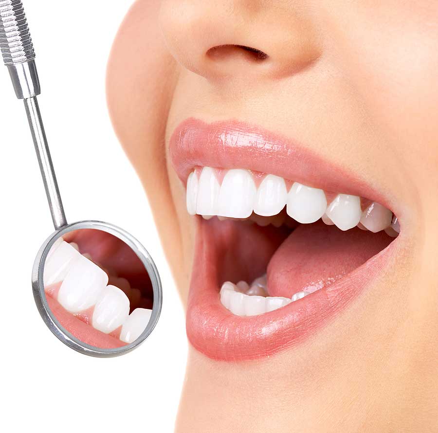 Woman smiling and showing a closeup of her teeth