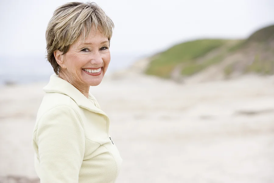 woman smiling on the beach