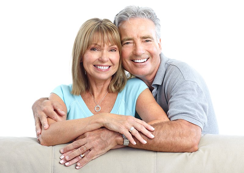 Senior Happy Couple With Dental Implants From Mark Herman DMD Dental Excellence